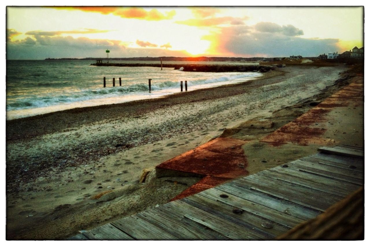 sea, water, beach, sunset, sky, horizon over water, transfer print, shore, tranquil scene, scenics, tranquility, beauty in nature, sand, auto post production filter, cloud - sky, nature, pier, idyllic, wave, built structure