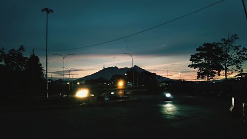 Illuminated street at night