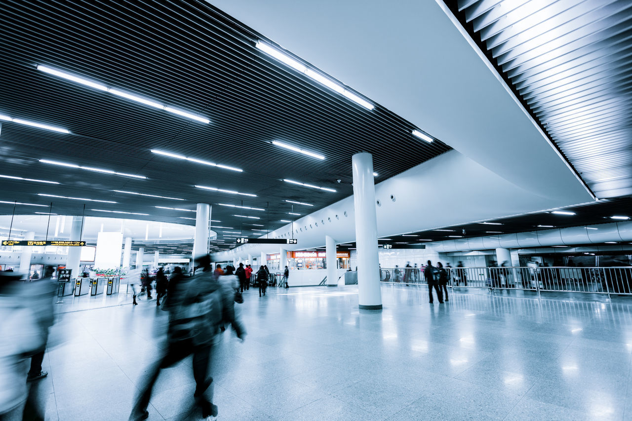 PEOPLE WALKING ON AIRPORT