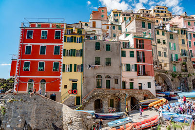 Multi colored buildings against clear sky