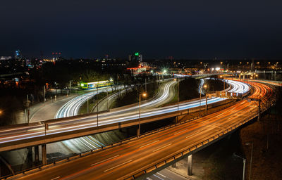 High angle view of illuminated bridge at night