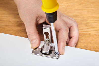 Midsection of person working on table