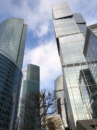 Low angle view of modern buildings against sky