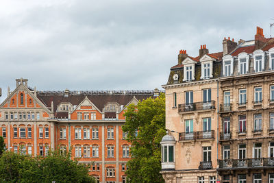 Low angle view of buildings against sky