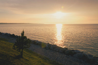 Scenic view of sea against sky during sunset