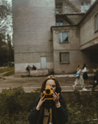 Full length of person photographing