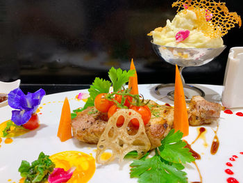 Close-up of roses served on table in restaurant