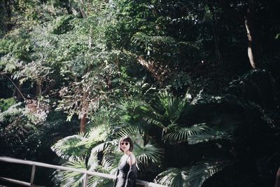 Portrait of man on tree