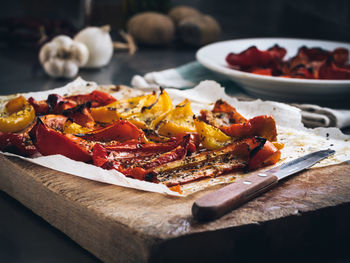 Close-up of peppers on cutting board