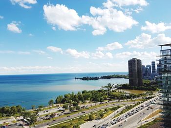 High angle view of city against cloudy sky
