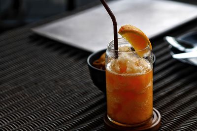 Close-up of beer in glass on table