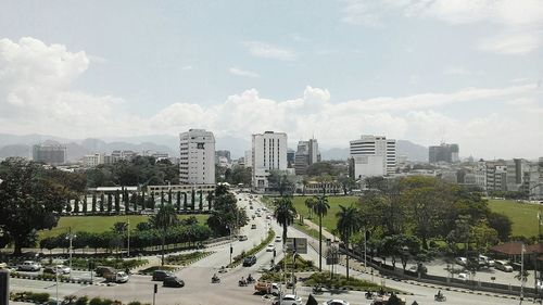 High angle view of street amidst buildings in city