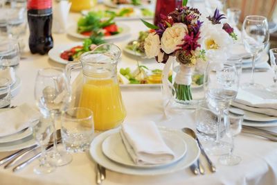 Glass of tea served on table