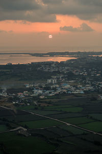 High angle view of townscape against sky during sunset