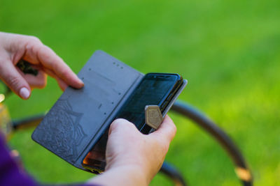 Close-up of person using mobile phone