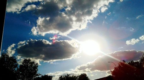 Low angle view of vapor trails in sky