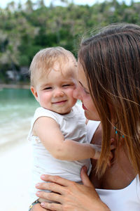 Portrait of happy mother and son