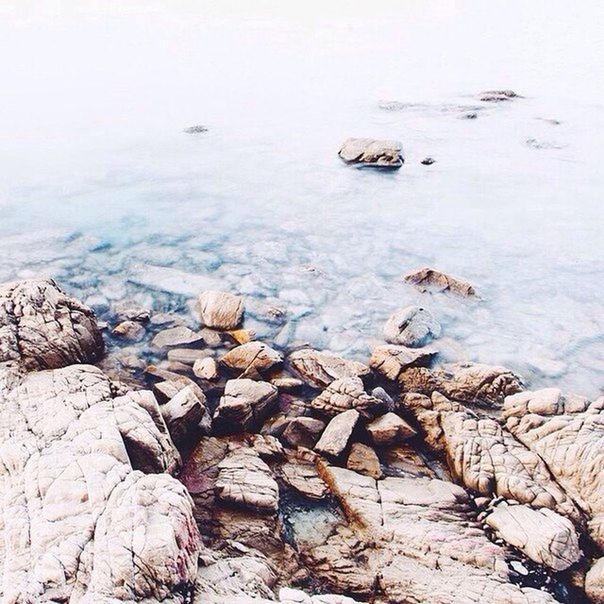 water, rock - object, tranquility, sea, nature, stone - object, tranquil scene, high angle view, scenics, beauty in nature, day, shore, lake, outdoors, rock, beach, stone, no people, rippled, river