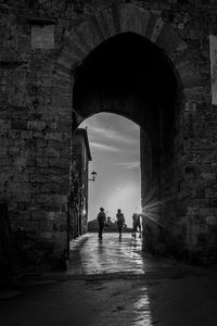 People walking in tunnel