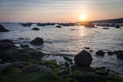 Scenic view of sea against sky during sunset