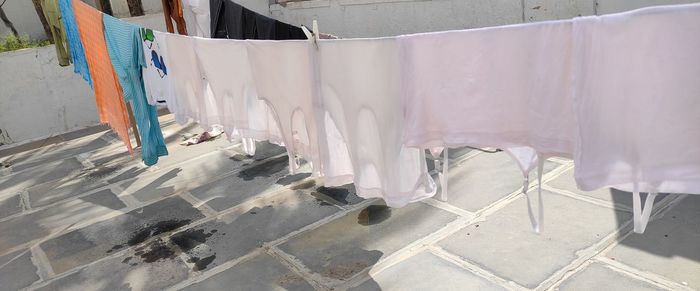High angle view of clothes drying on concrete wall
