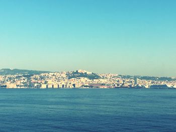 View of cityscape against clear sky