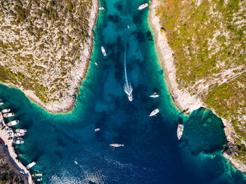 High angle view of rocks in sea