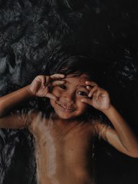 This is a photo of my nephews who are very happy when they bathe in the river