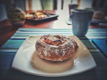 Close-up of cake in plate on table