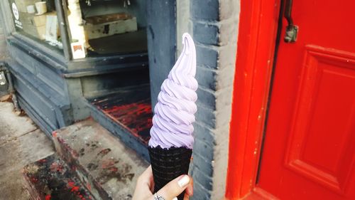 Close-up of red hand