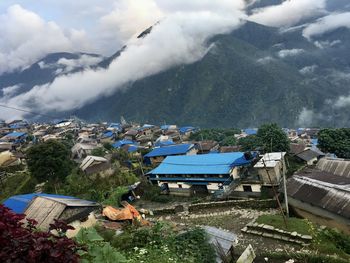 High angle view of townscape and mountains