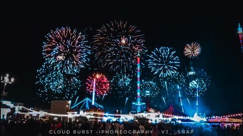 Firework display at night