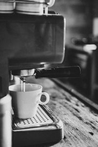 Close-up of coffee on espresso machine