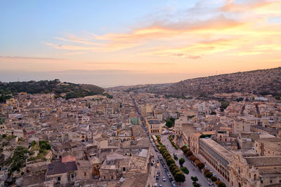 High angle view of townscape against sky during sunset