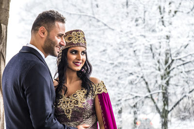 Bride with bridegroom during weeding ceremony