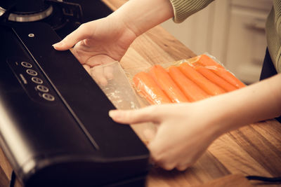 High angle view of woman preparing food