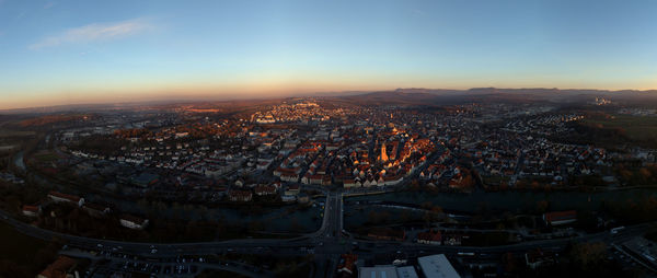 High angle view of city at sunset