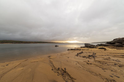 Scenic view of beach against sky