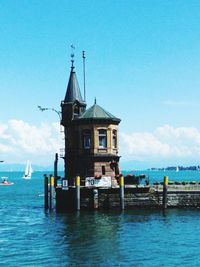 View of sailboat in sea against sky