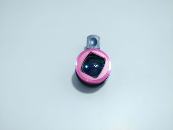 High angle view of multi colored umbrella against white background