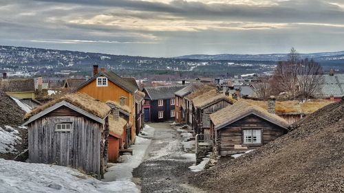 High angle view of houses in city during winter