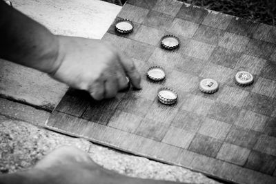 Low section of man playing on table
