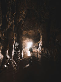 Man standing in cave