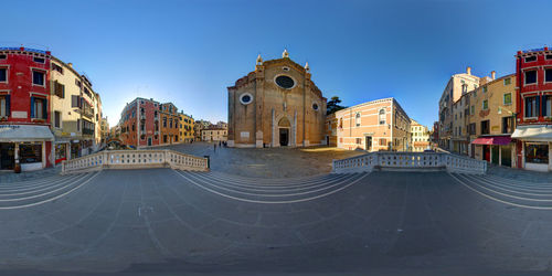 Fish-eye view of city against clear sky