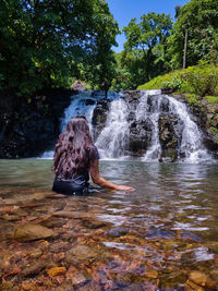 Scenic view of waterfall in forest