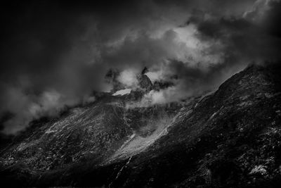 Scenic view of volcanic mountain against sky