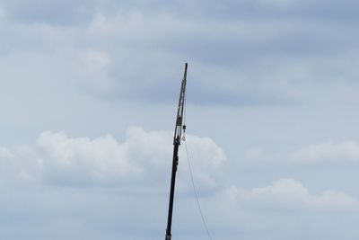 Low angle view of sailboat against sky