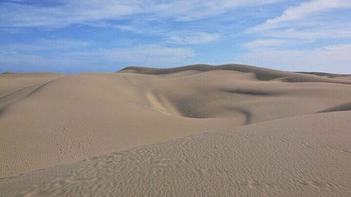 Scenic view of desert against sky