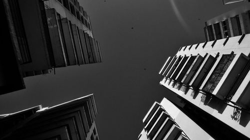 Low angle view of skyscrapers against sky