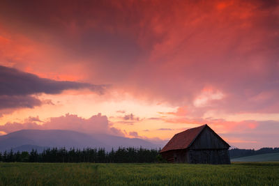 Rural landscape with a traditional barn in turiec region, slovakia.